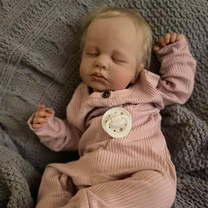 20 inch reborn doll with closed eyes and blonde hair