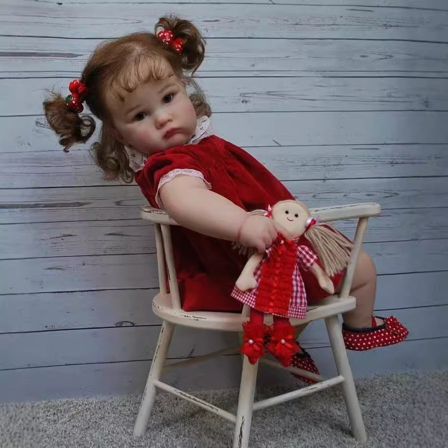 Stella 60cm Reborn Doll with blue eyes and red dress