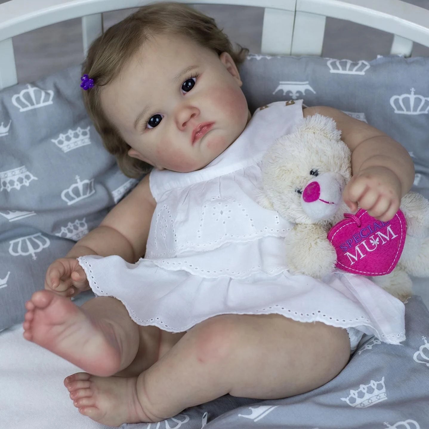 Cheryl 60cm Reborn Doll with blue eyes and brown hair