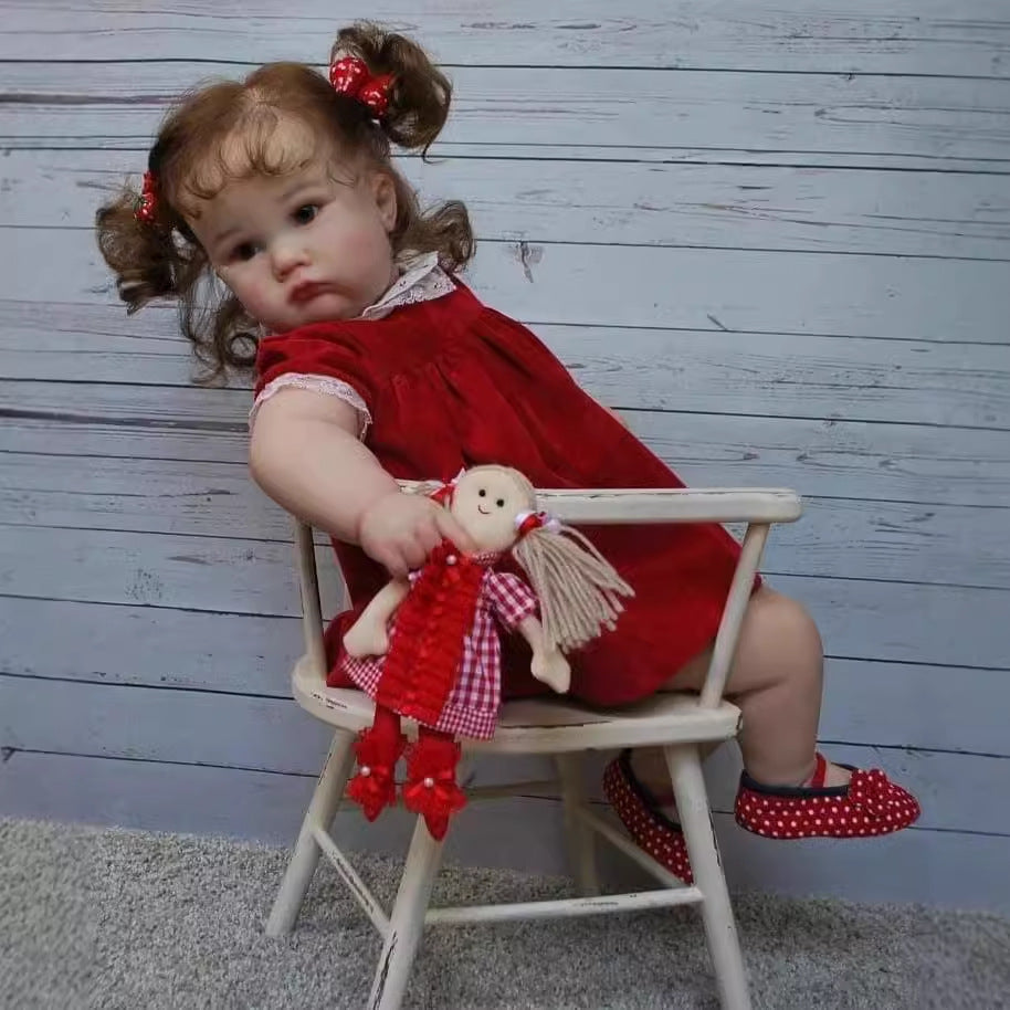 Stella 60cm Reborn Doll con occhi azzurri e vestito rosso