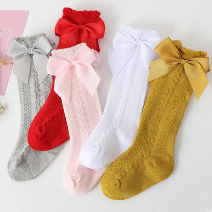 Mid-length knee-length children's socks with bow