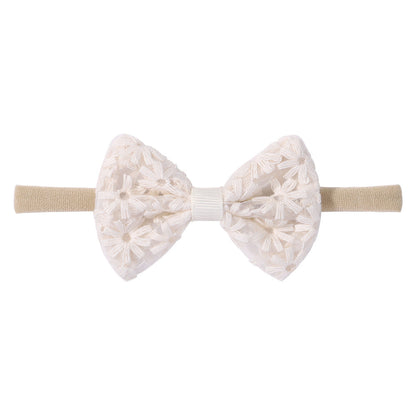 Embroidered hair band with bow