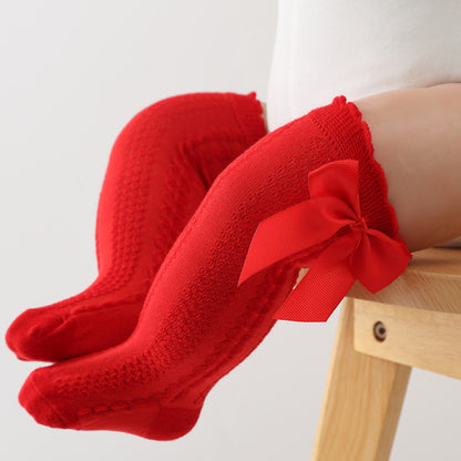 Mid-length knee-length children's socks with bow