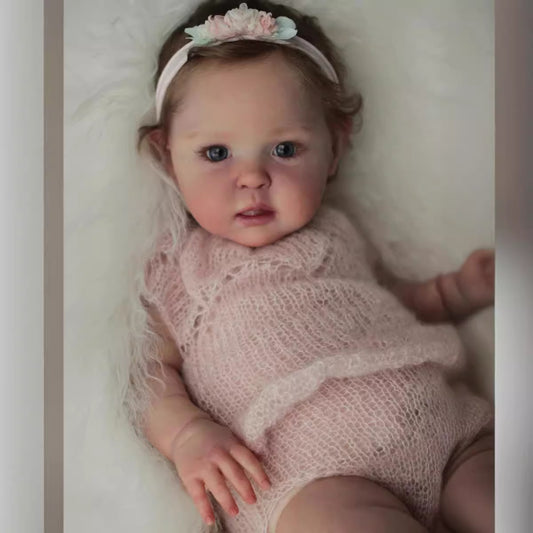 20 inch reborn doll with blue eyes and short hair