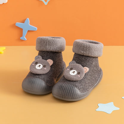 Calde scarpe da bambino con la suola morbida dell'orso dei cartoni animati