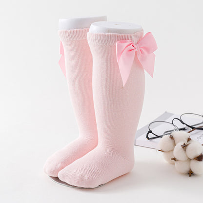 Loose socks in solid color with large knee-high butterfly