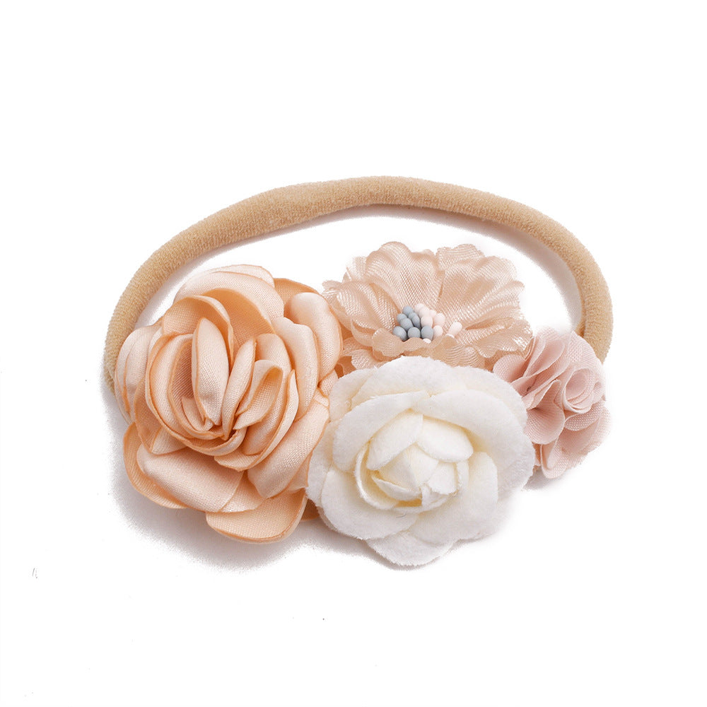 Pastoral headband for children in elastic nylon with flower