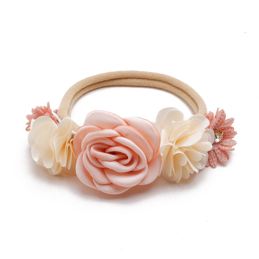 Pastoral headband for children in elastic nylon with flower