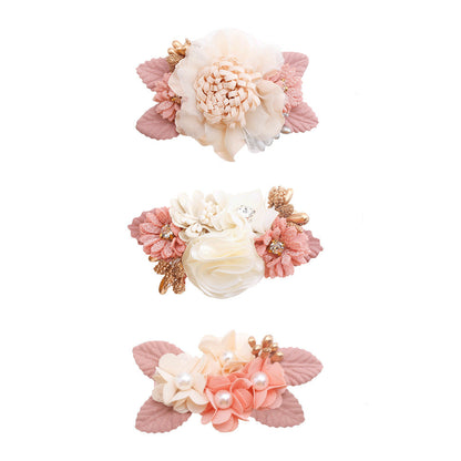 Cute three-piece set of pink artificial flower hair clips