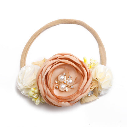 Pastoral headband for children in elastic nylon with flower