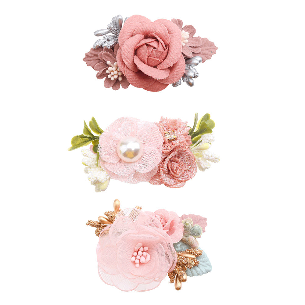 Cute three-piece set of pink artificial flower hair clips