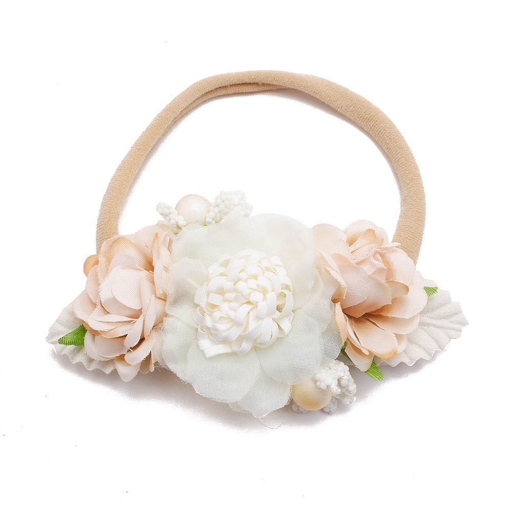 Pastoral headband for children in elastic nylon with flower