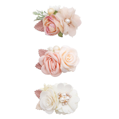 Cute three-piece set of pink artificial flower hair clips