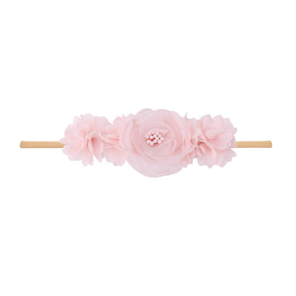 Pastoral headband for children in elastic nylon with flower