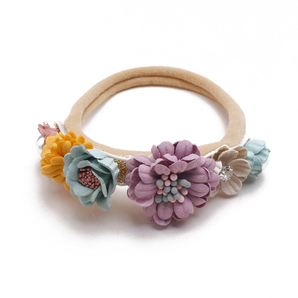 Pastoral headband for children in elastic nylon with flower